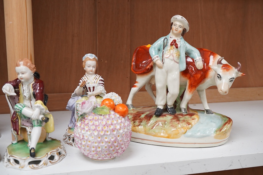 Four pairs of porcelain figures, a single figure and seated figure group, all after Chelsea and Derby originals, together with a Meissen style schneeballen porcelain sucrier and cover, (12)